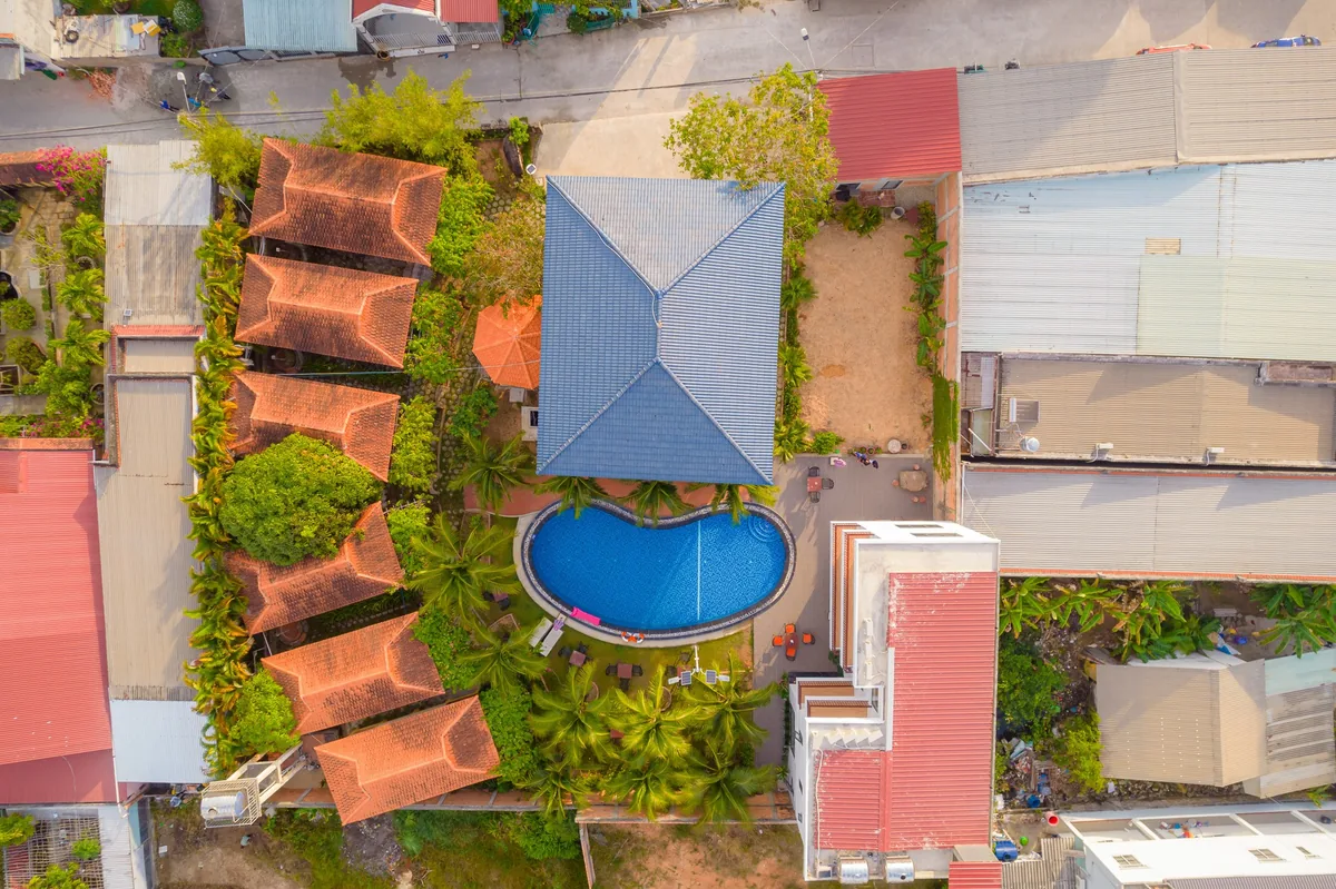 Aerial view of Hung Vuong Resort among the houses of Duong Dong