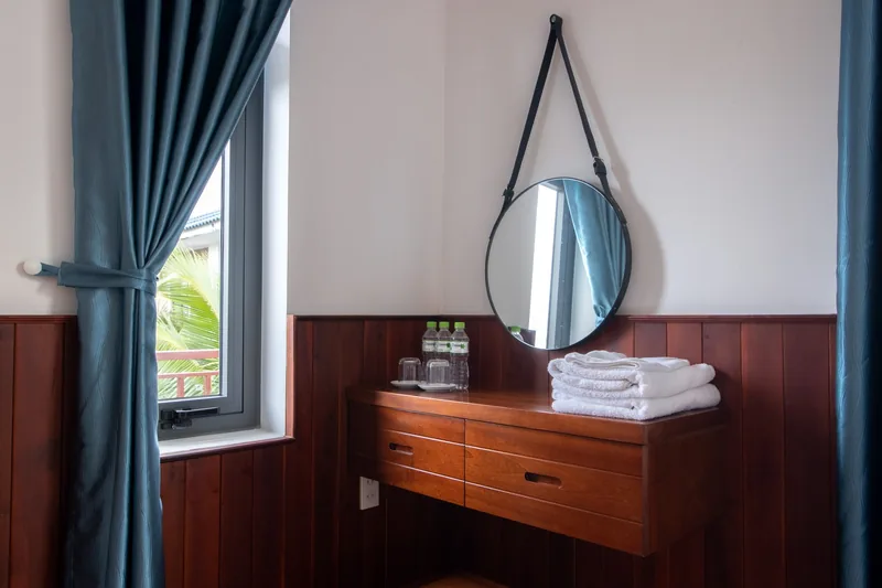 Dressing table with a round mirror in the family room